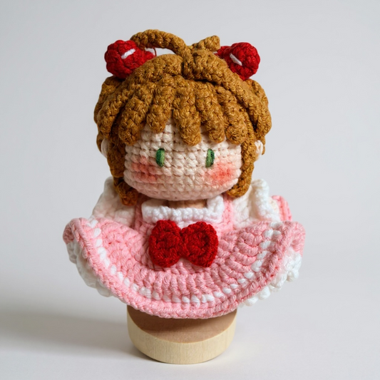 Crochet little girl with pink dress